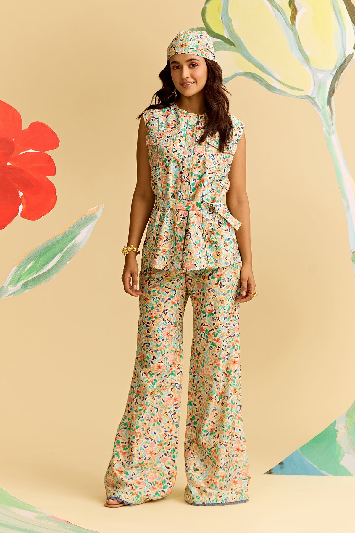 Ivory Multicoloured Printed Chanderi Sleeveless Shirt Paired With Flared Pants And Tie Up Belt