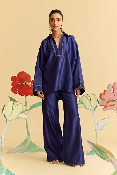 Blue Oversized Shirt Paired With Flared Pants