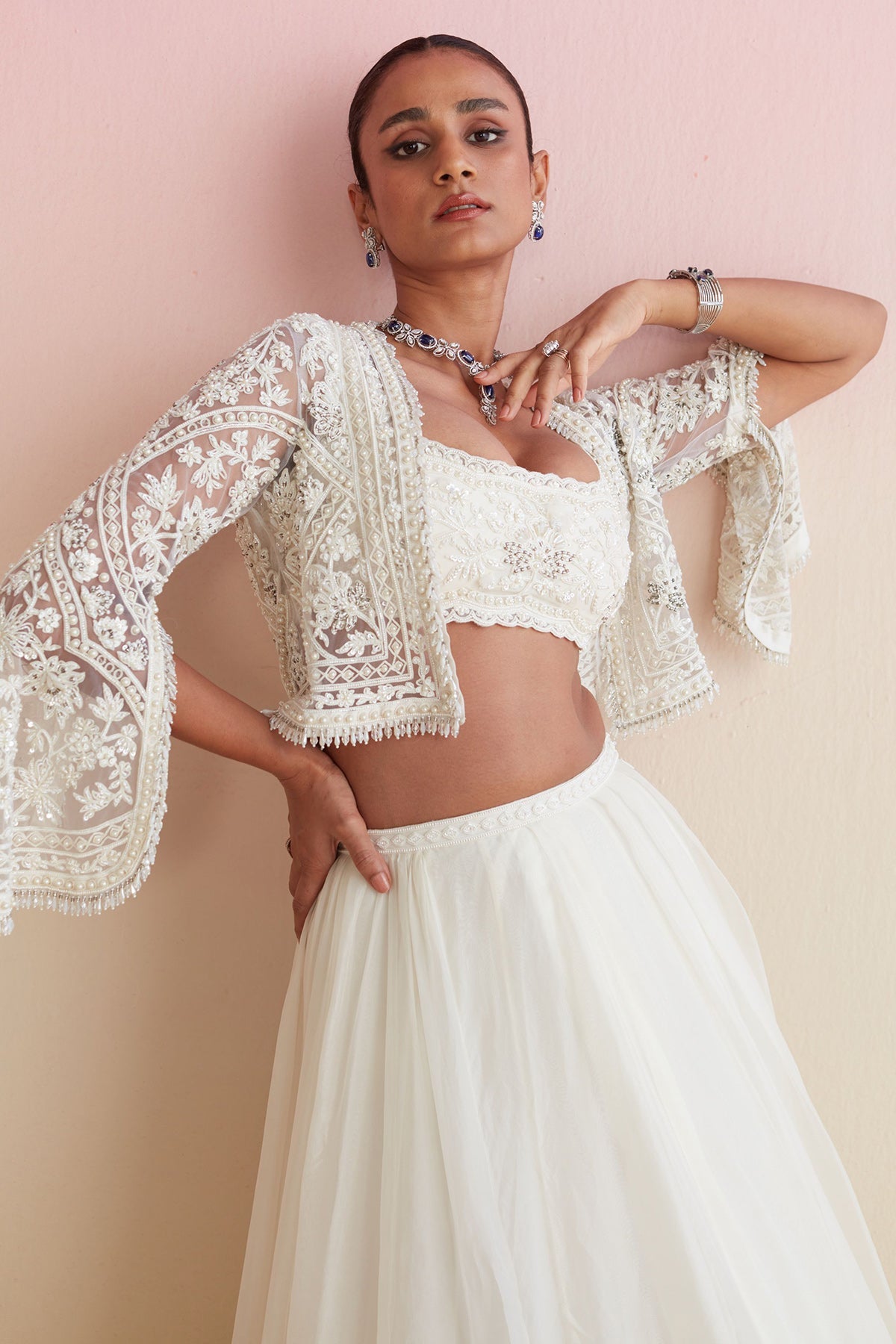 RIDHIMEHRA-IVORY FULLY EMBROIDERED-SLEEVELESS-LEHENGA