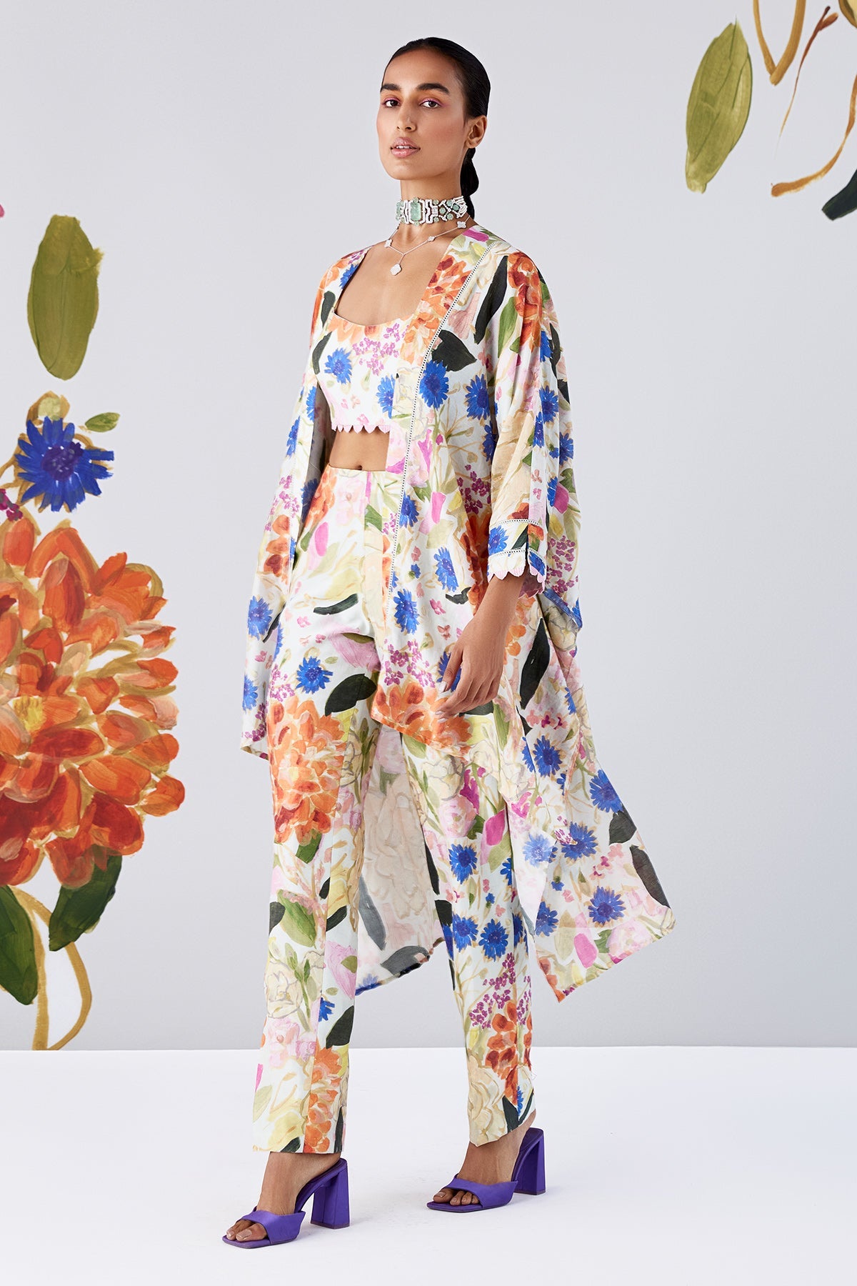 RM-Green-Multicolored-cape and bustier paired with pants and tie up belt 