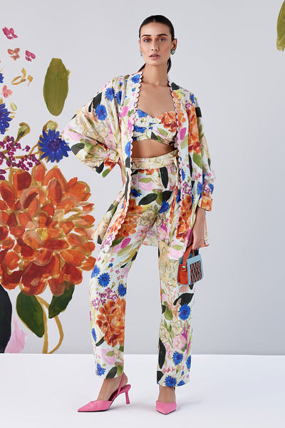 RM-Green Multicolored cape and bustier paired with pants and tie up belt