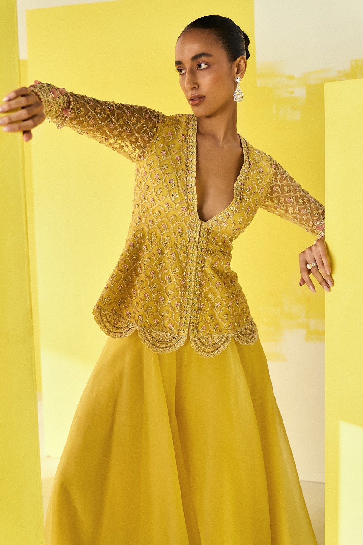 Ridhi-Mehra--Yellow Net Embroidered Peplum Sharara