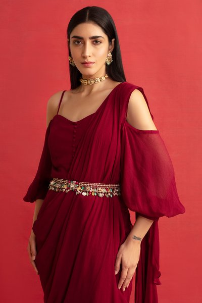 RIDHI-MEHRA-Deep Fuschia chiffon peplum and chiffon-organza draped ruffle saree paired with jeweled embroidered belt.