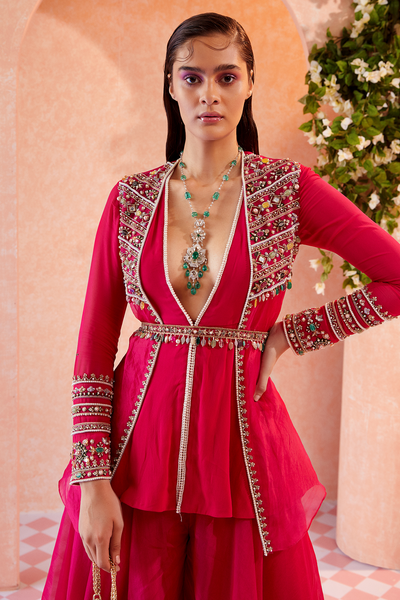 RIDHI-MEHRA-Fuschia Georgette peplum with an organza overlay jacket paired with organza sharara