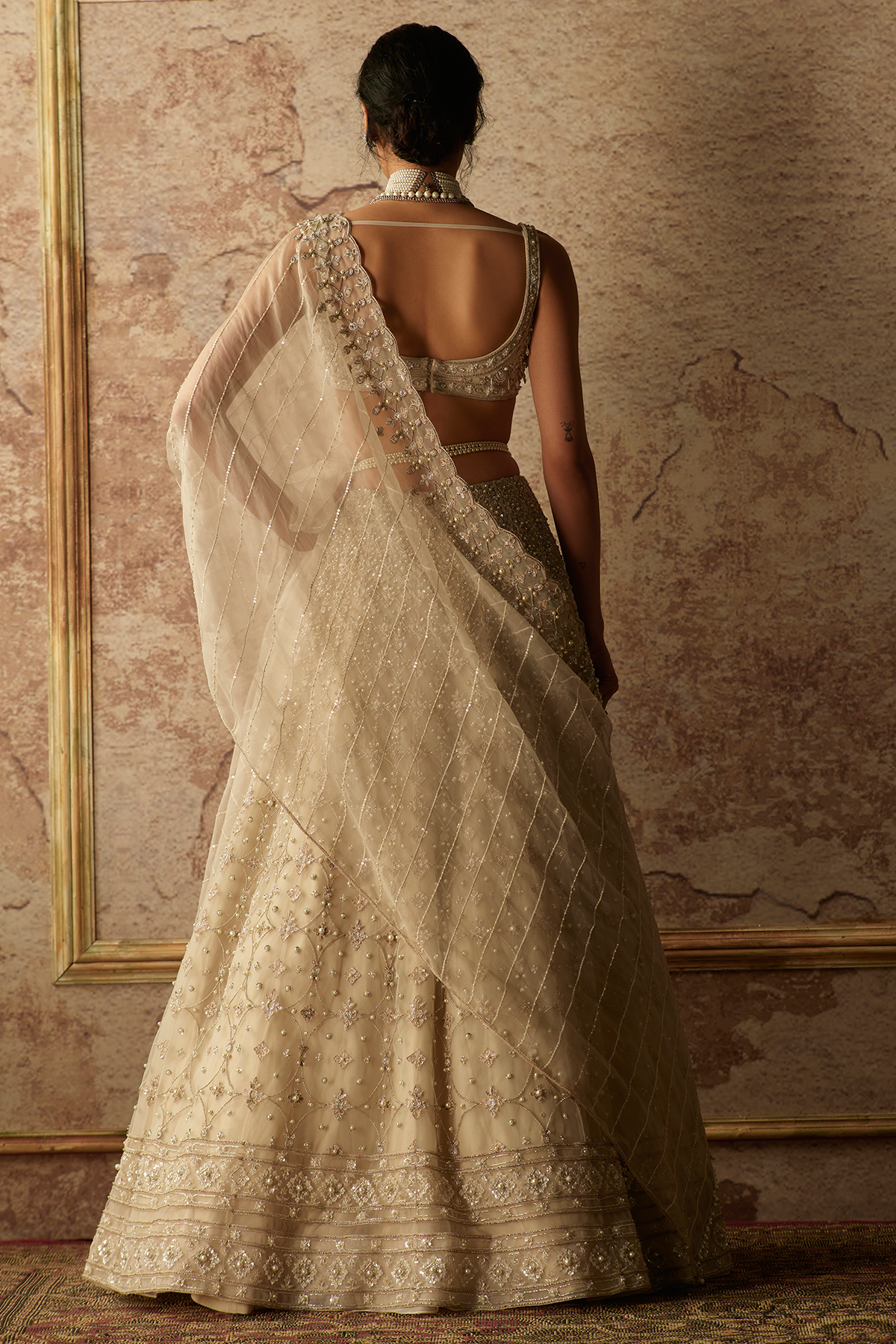 RIDHI-MEHRA_Ivory heavily embroidered lehenga