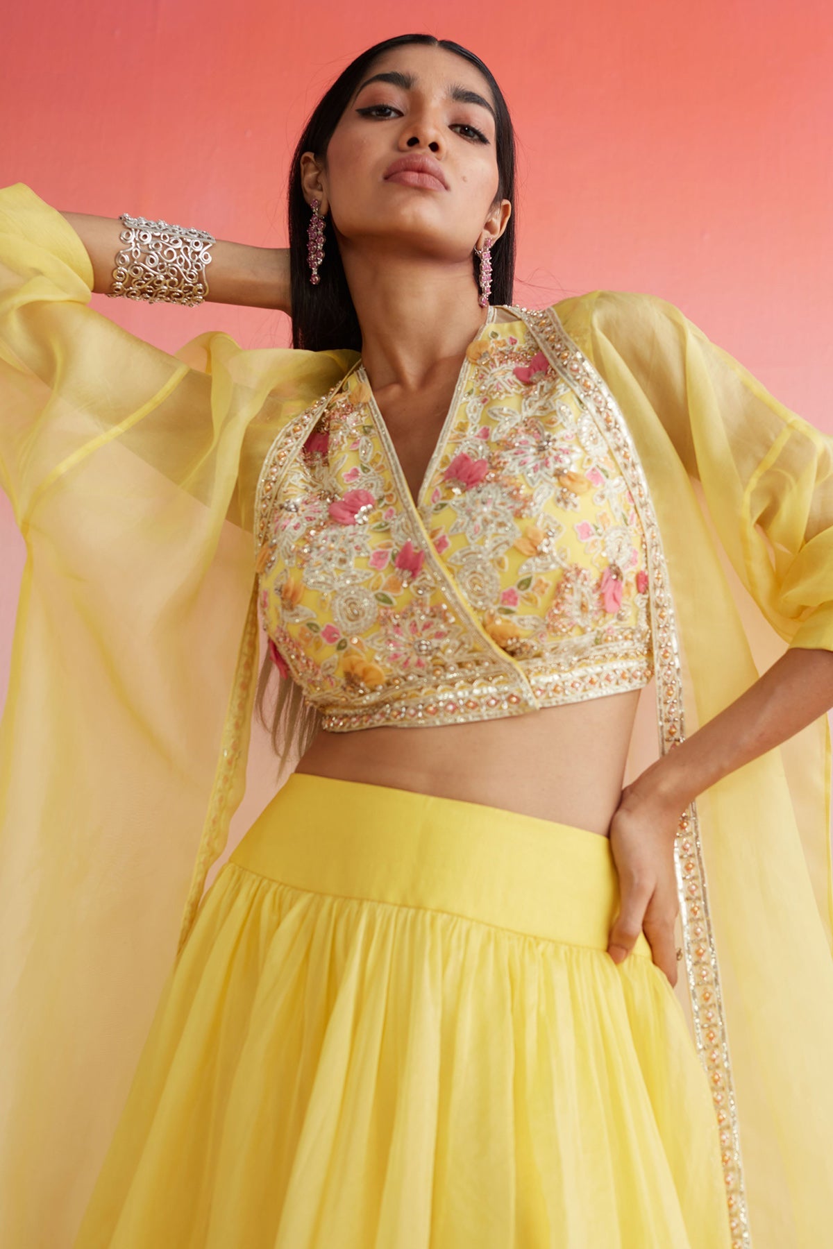 RIDHIMEHRA-YELLOW-NET EMBROIDERED BLOUSE PAIRED WITH PLAIN ORGANZA SKIRT