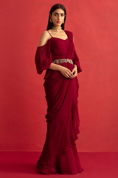 RM-Deep Fuschia chiffon peplum and chiffon-organza draped ruffle saree paired with jeweled embroidered belt.