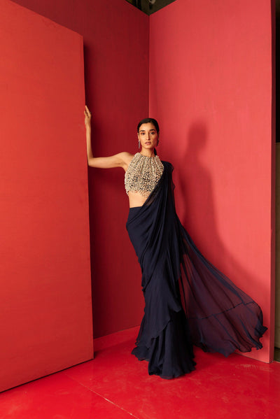 RM-Pearl embellished blouse paired with a navy draped chiffon saree