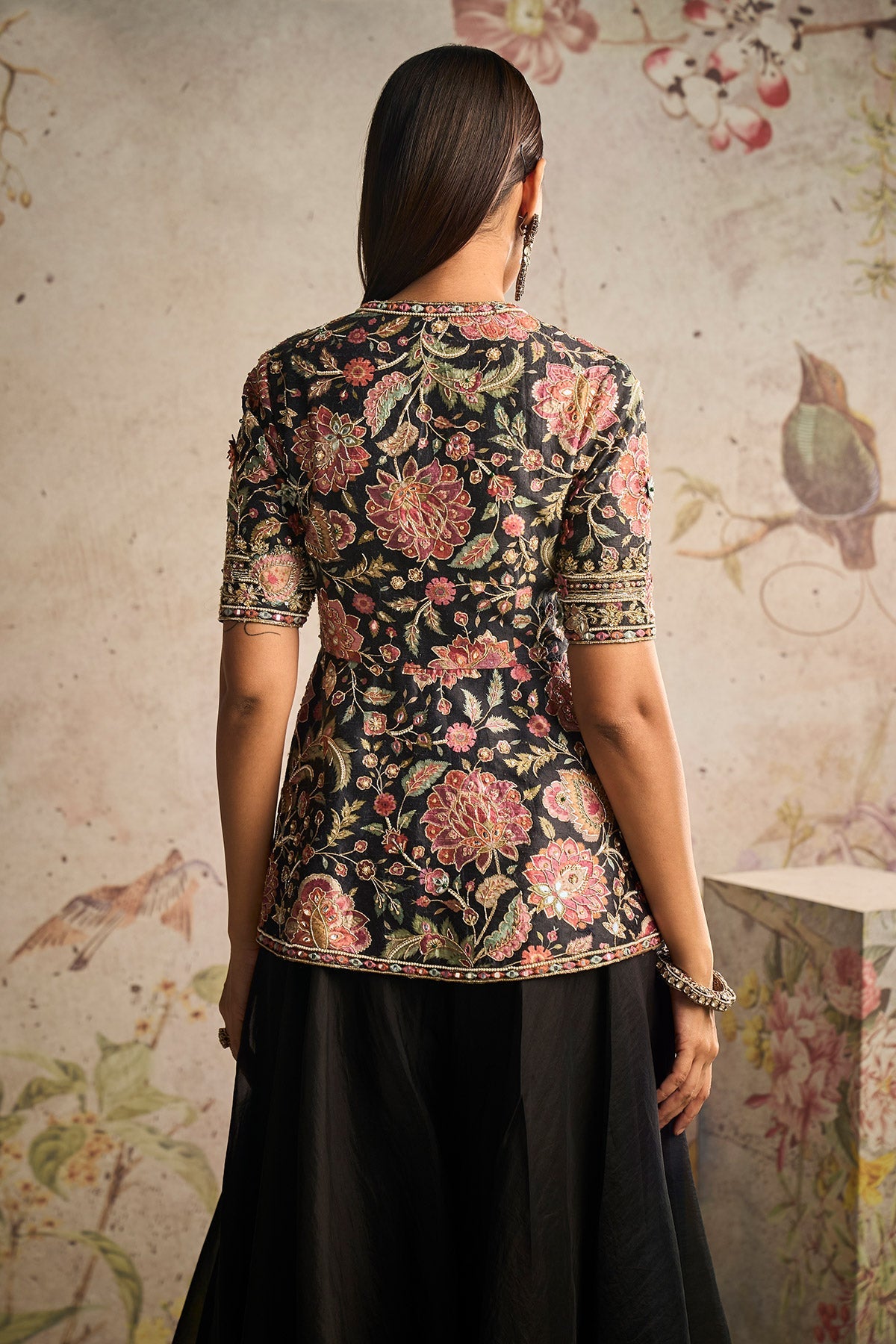 Ridhi-Mehra-Black-Printed Raw Silk Embroidered Peplum With Black Solid Organza Flared Sharara